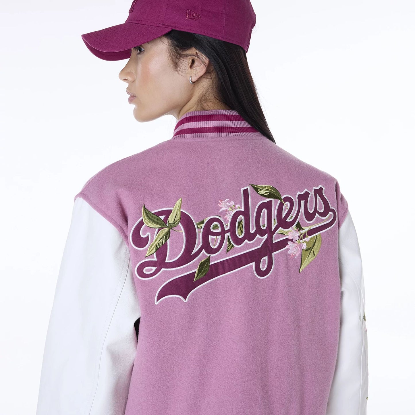 The Female model is wearing LA Dodgers Womens MLB Floral Dark Pink Varsity Jacket 4