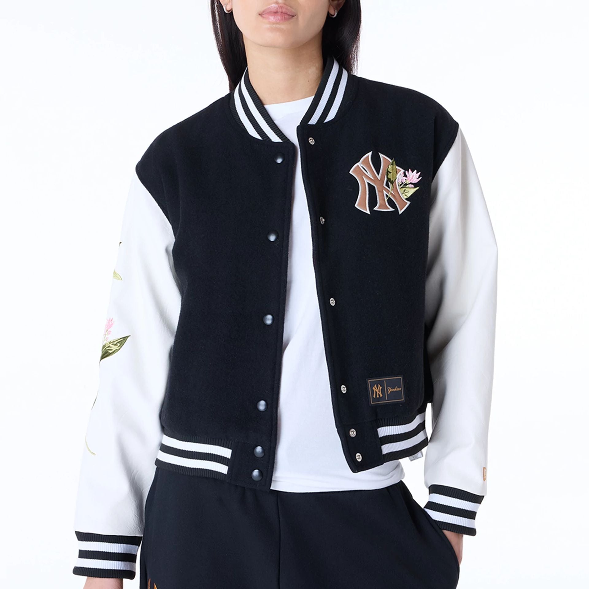 The Female model is wearing New York Yankees Womens MLB Floral Black Varsity Jacket 2