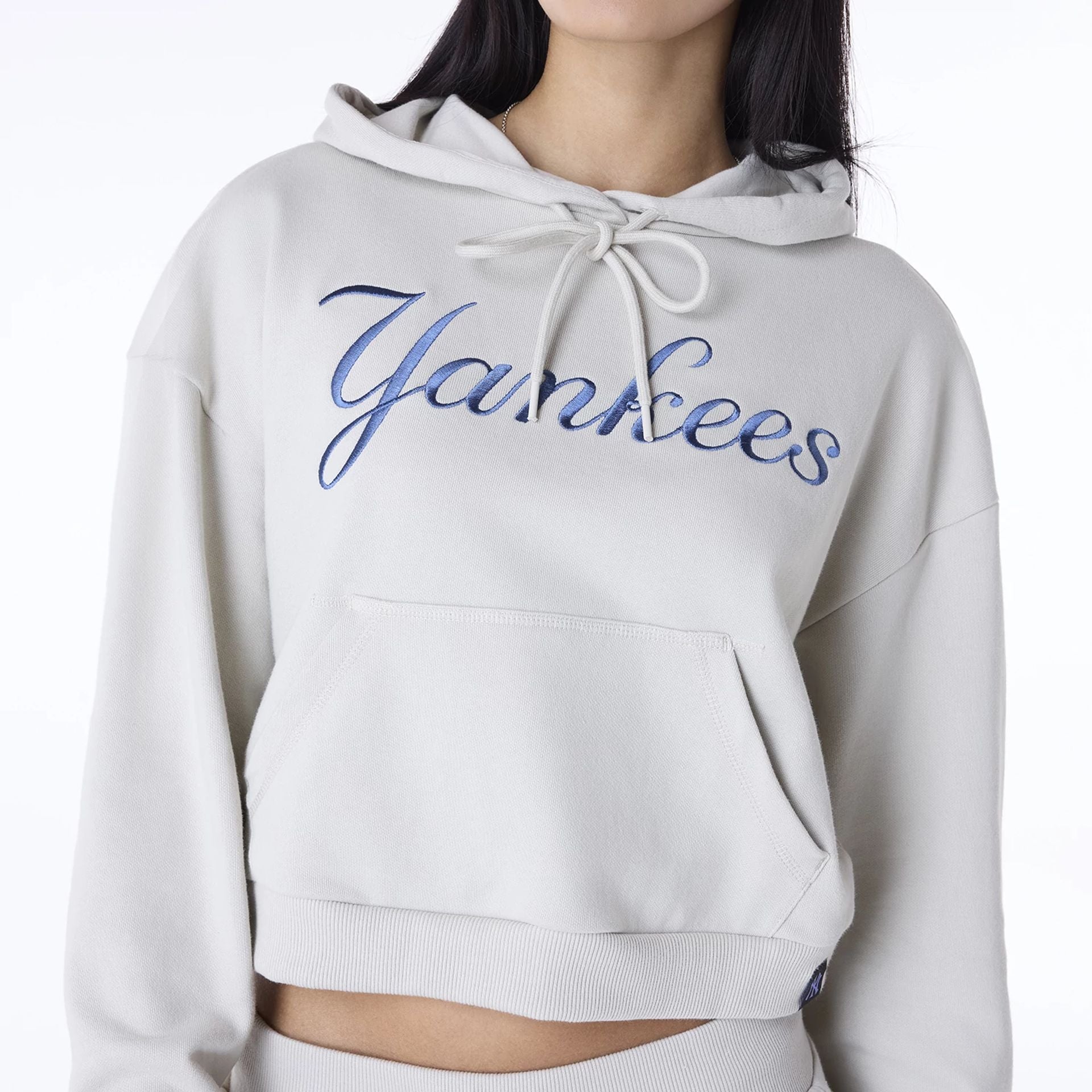 The Female model is wearing New York Yankees Womens MLB Graphic Light Beige Pullover Hoodie 7