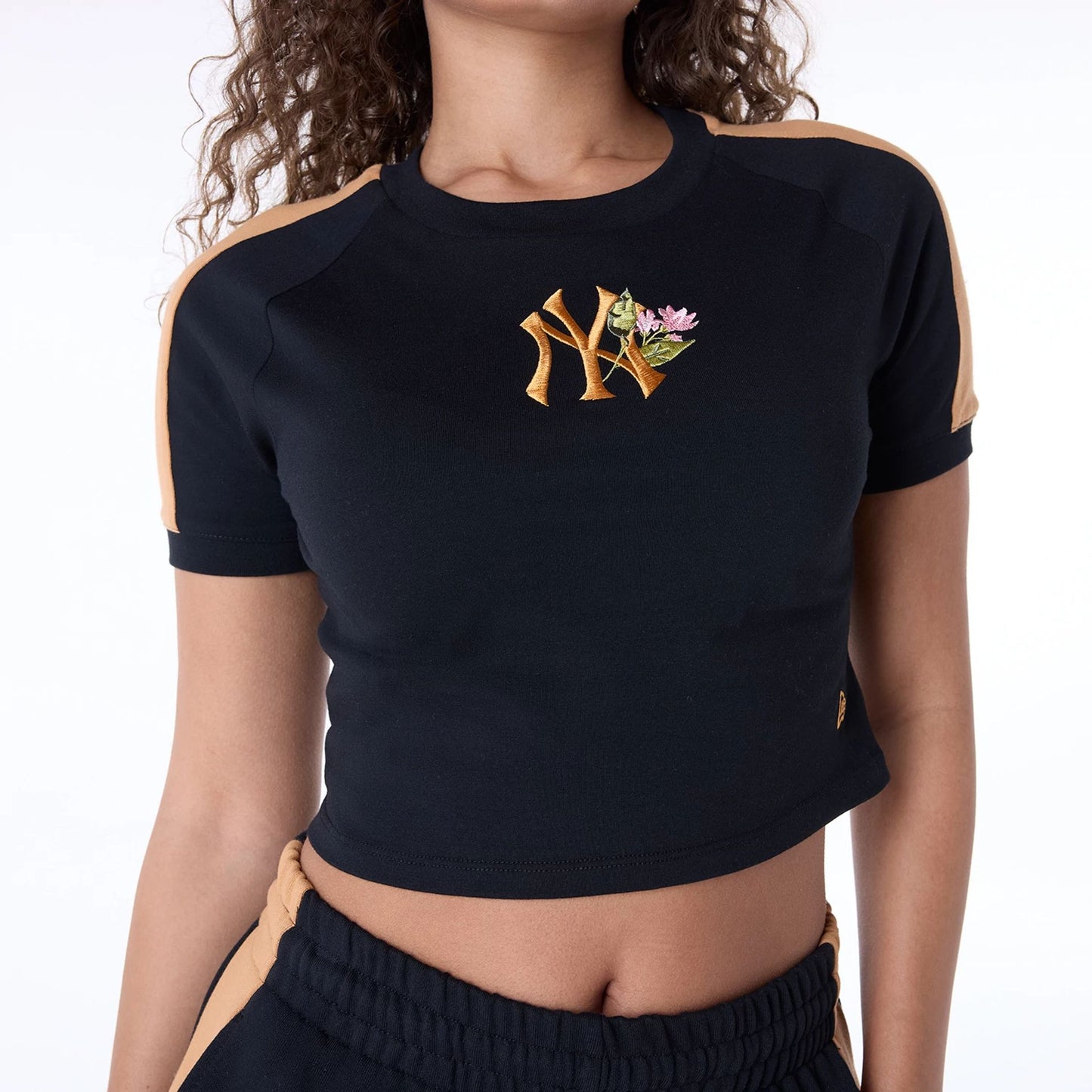 The Female model is wearing New York Yankees Womens MLB Floral Black T-Shirt 2