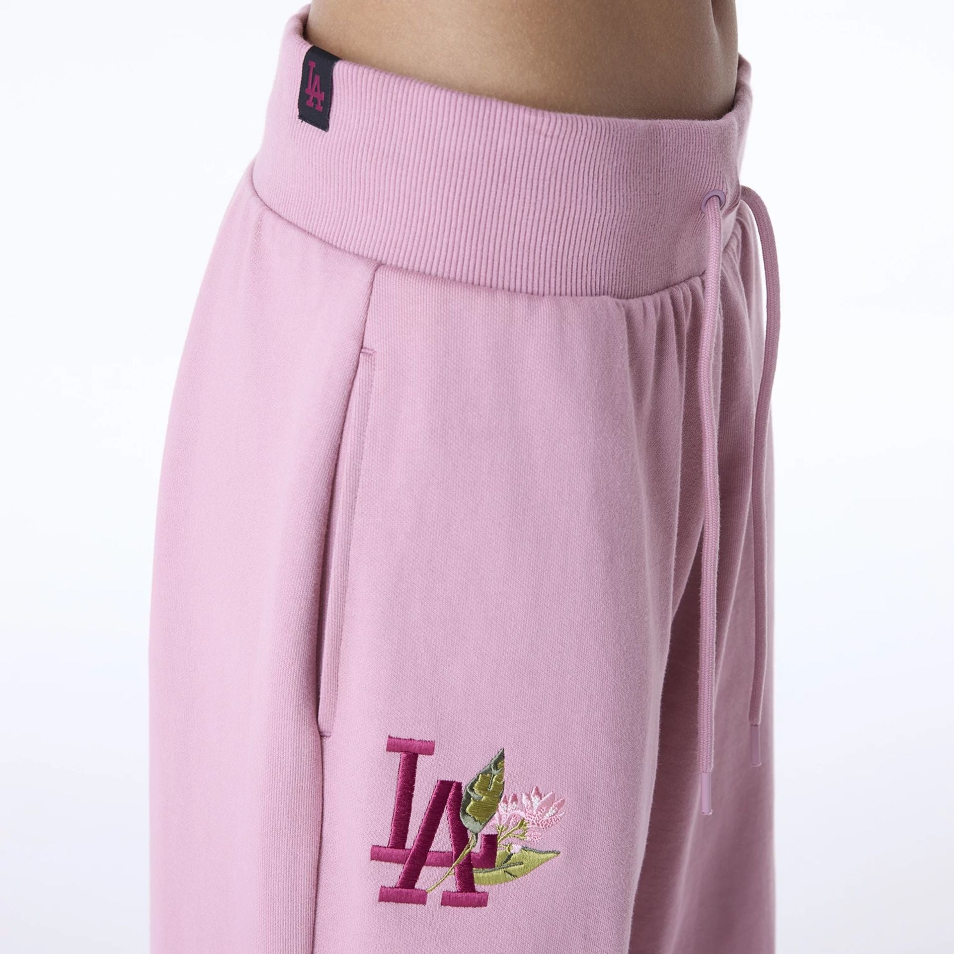 The Female model is wearing LA Dodgers Womens MLB Floral Dark Pink Joggers 2