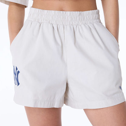 The Female model is wearing New York Yankees Womens MLB Light Beige Shorts 6