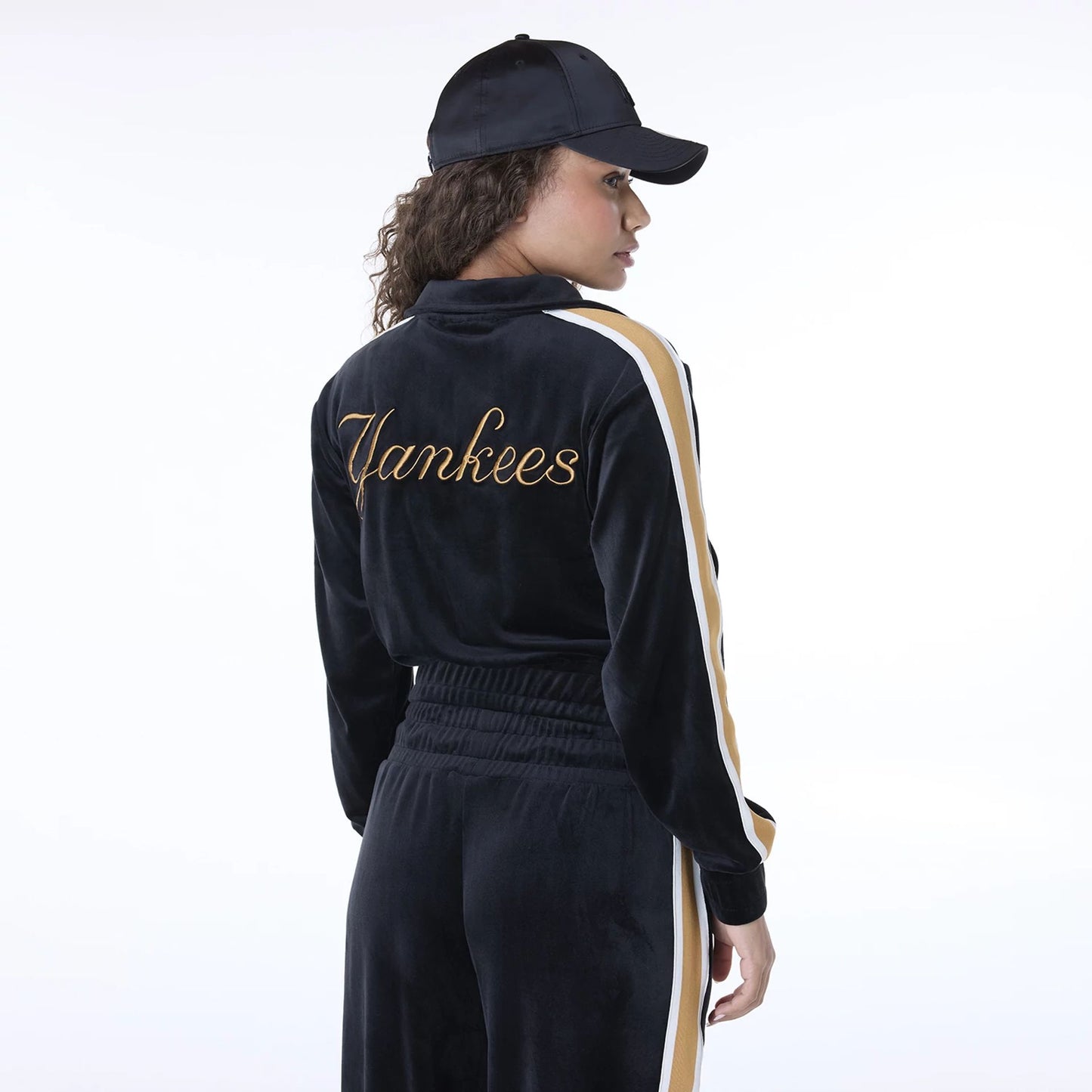 The Female model is wearing New York Yankees Womens MLB Velour Black Track Jacket 7