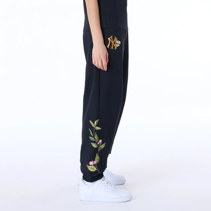 The Female model is wearing New York Yankees Womens MLB Floral Black Joggers 2