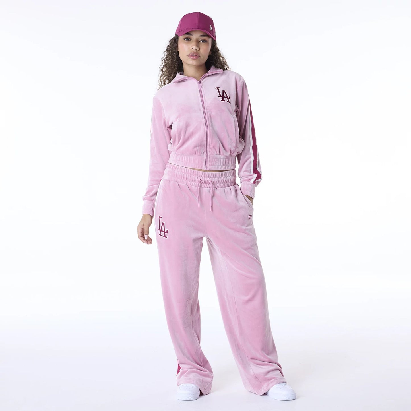 The Female model is wearing LA Dodgers Womens MLB Velour Dark Pink Joggers 3