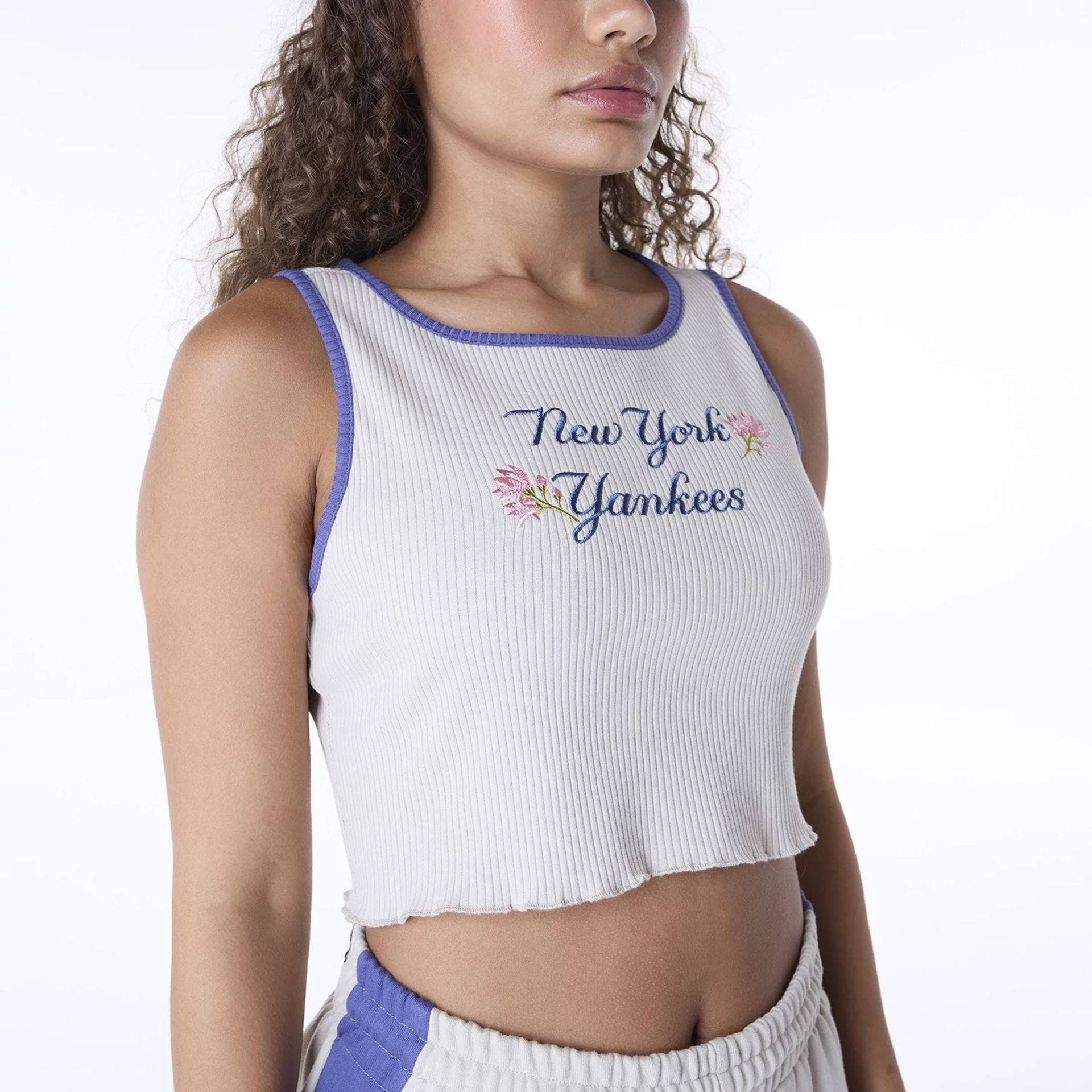 The Female model is wearing New York Yankees Womens MLB Floral Light Beige Vest 8