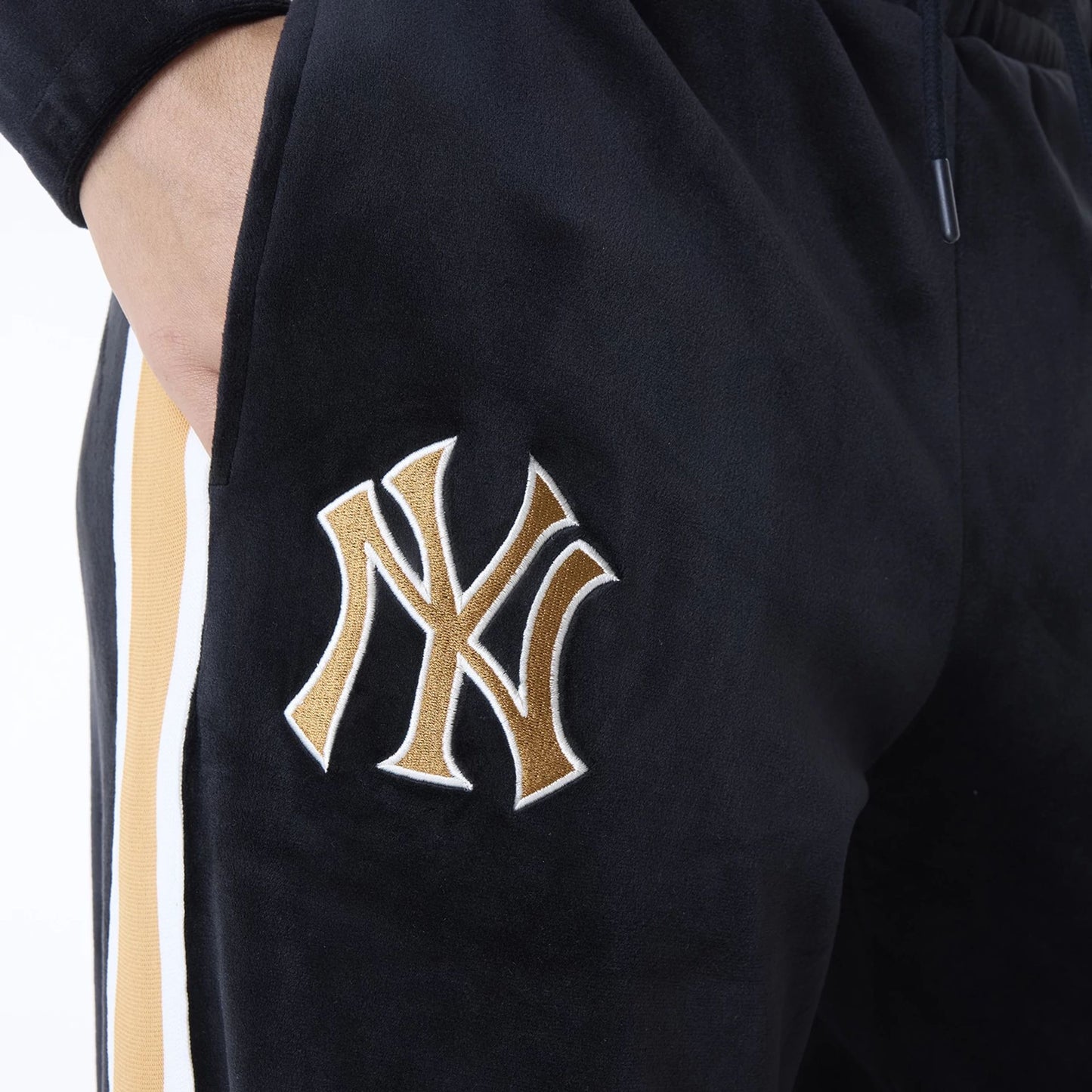 The Female model is wearing New York Yankees Womens MLB Velour Black Joggers 7