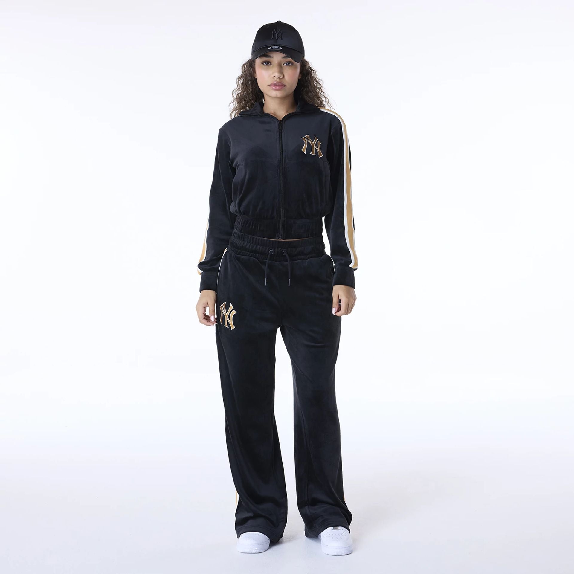 The Female model is wearing New York Yankees Womens MLB Velour Black Joggers 3