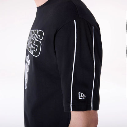 The Male model is wearing Las Vegas Raiders NFL Heritage Black Oversized T-Shirt 3