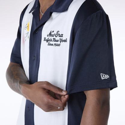 The Male model is wearing New Era Stripe Revere Navy Short Sleeve Shirt 7