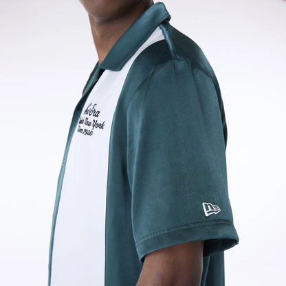 The Male model is wearing New Era Stripe Revere Dark Green Short Sleeve Shirt 4