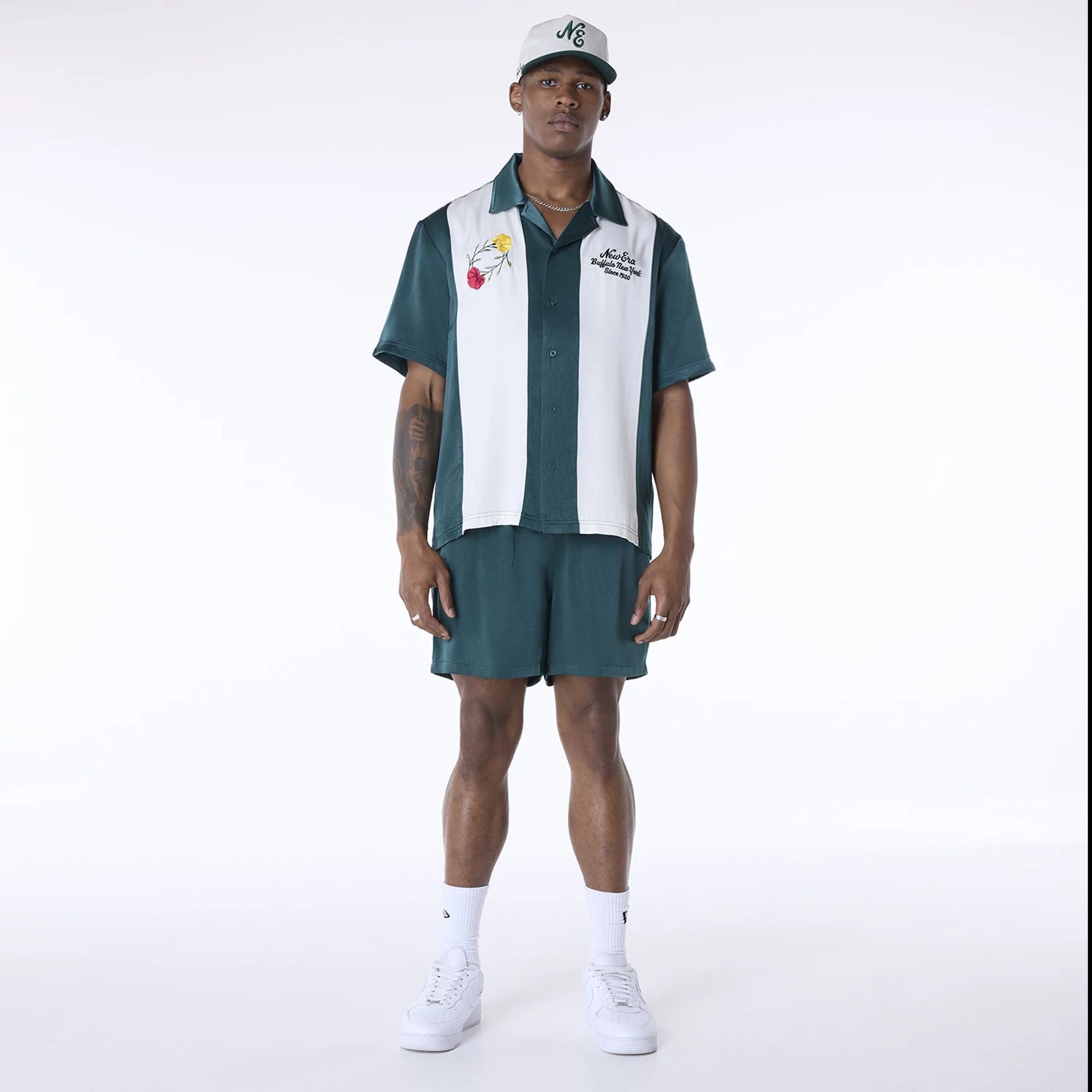 The Male model is wearing New Era Stripe Revere Dark Green Short Sleeve Shirt 3