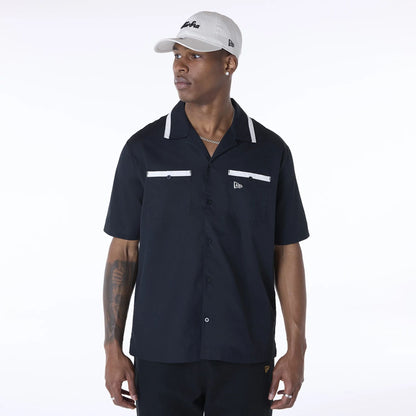 The Male model is wearing New Era Revere Black Short Sleeve Shirt 6