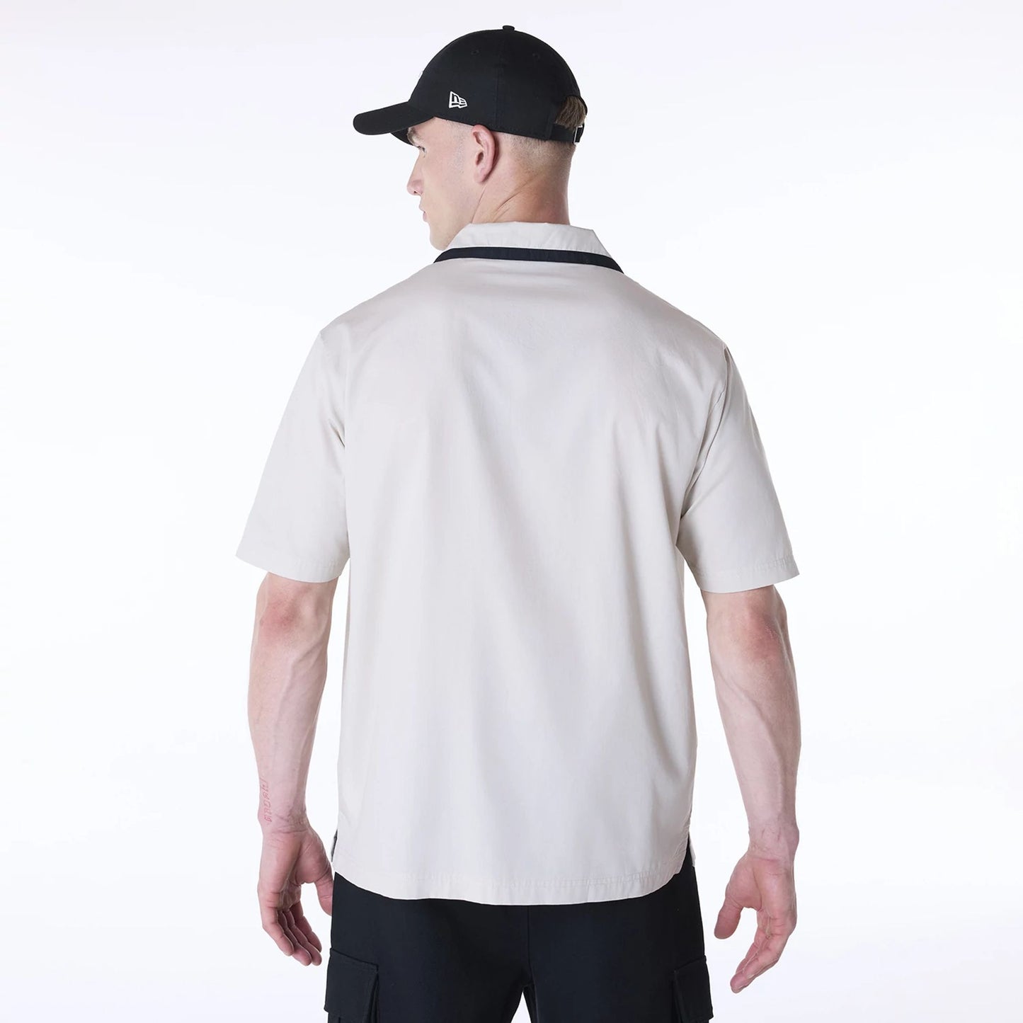 The Male model is wearing New Era Revere Cream Short Sleeve Shirt 5