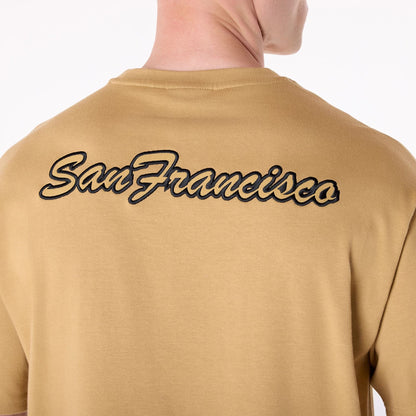 The Male model is wearing San Francisco 49Ers NFL Heritage Beige Oversized T-Shirt 5