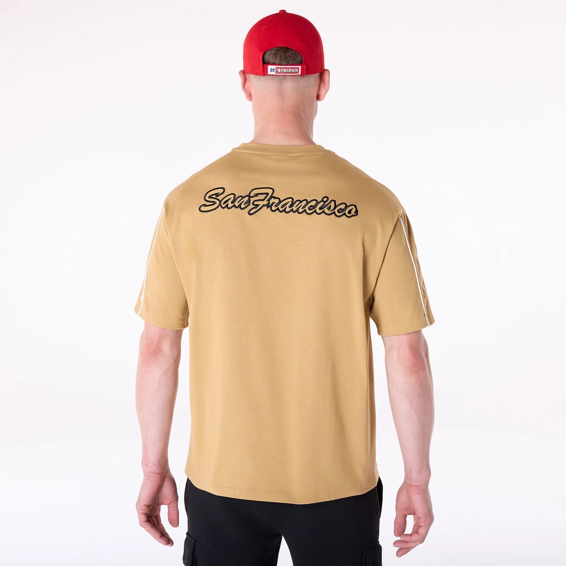 The Male model is wearing San Francisco 49Ers NFL Heritage Beige Oversized T-Shirt 2