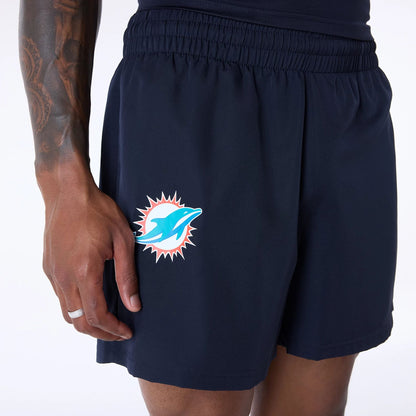 The Male model is wearing Miami Dolphins NFL Essentials Navy Shorts 4