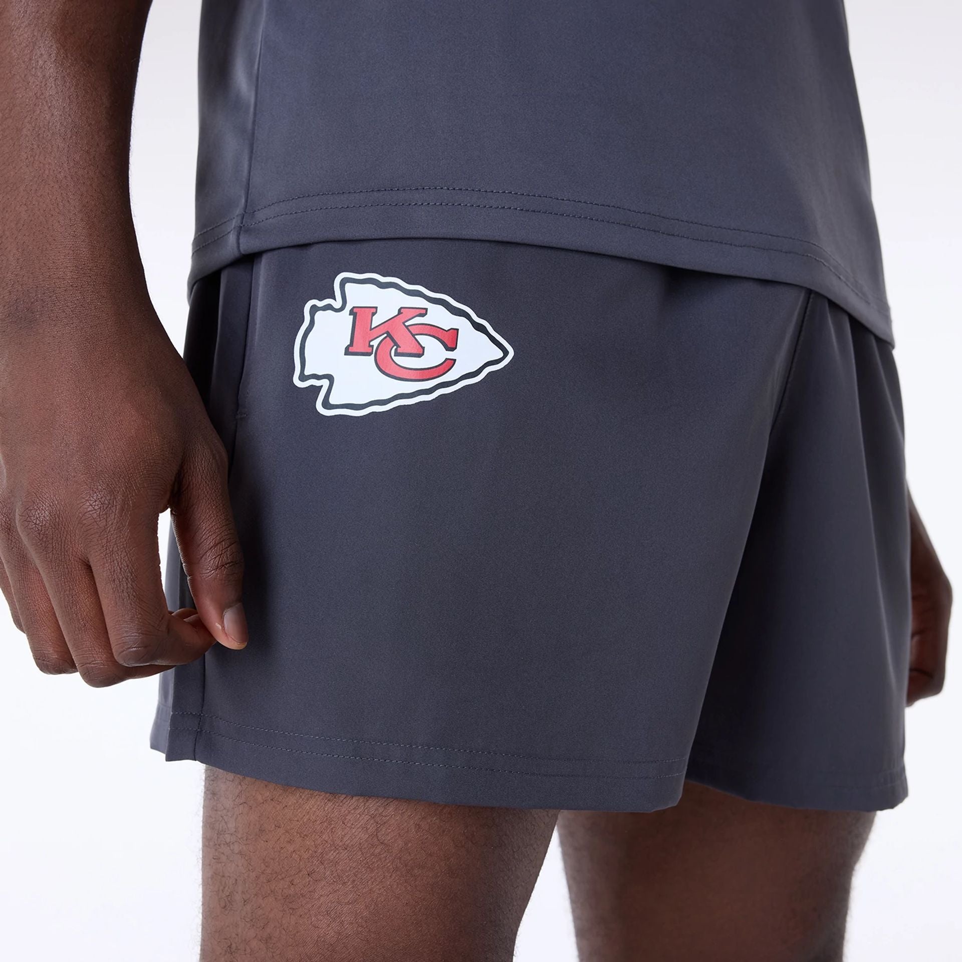 The Male model is wearing Kansas City Chiefs NFL Essentials Dark Grey Shorts 8