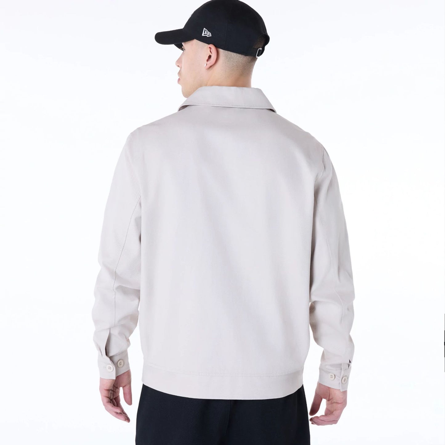 The Male model is wearing New Era Collared Cream Jacket 2