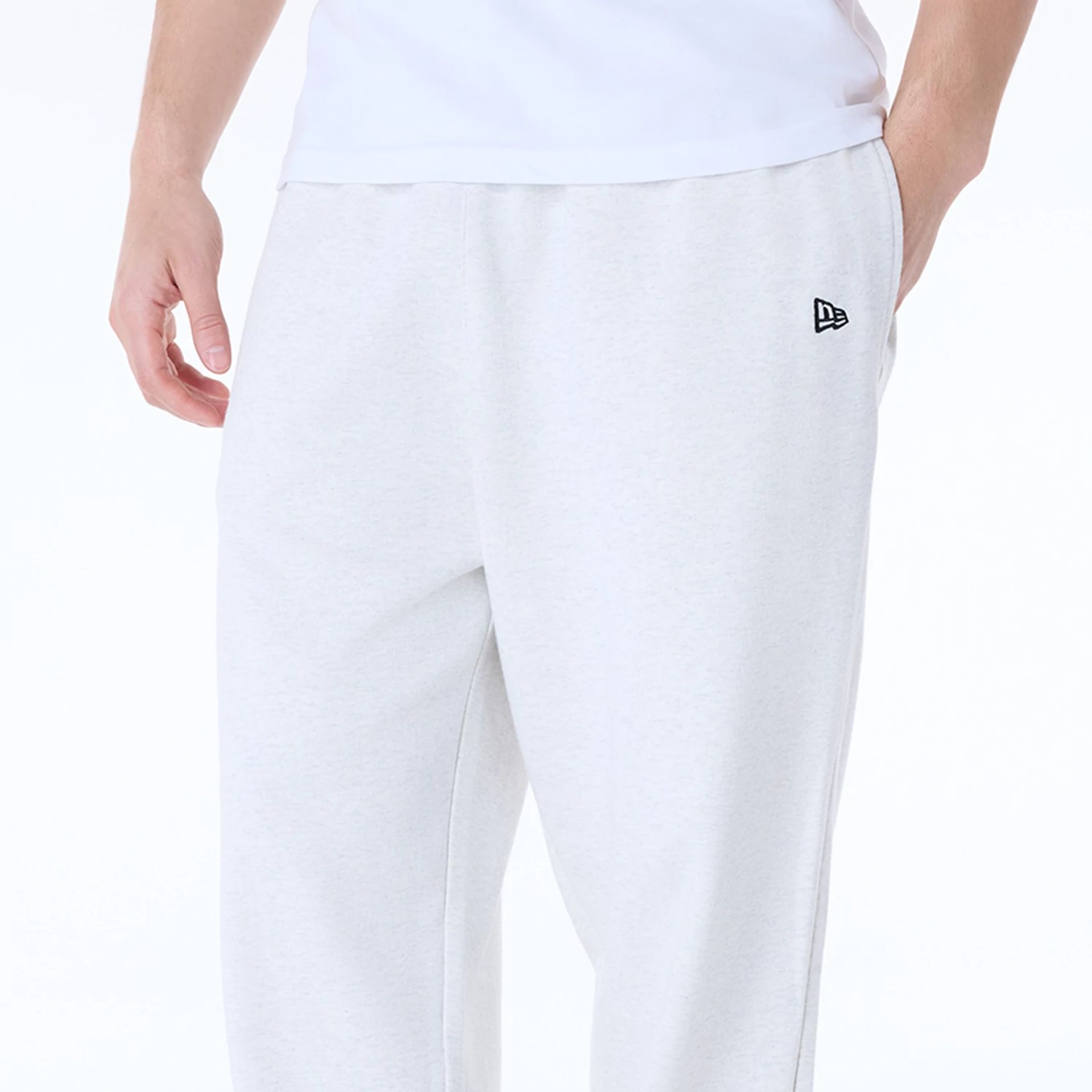 The Male model is wearing New Era Straight Pastel Grey Joggers 8