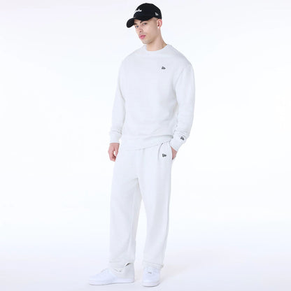 The Male model is wearing New Era Straight Pastel Grey Joggers 4