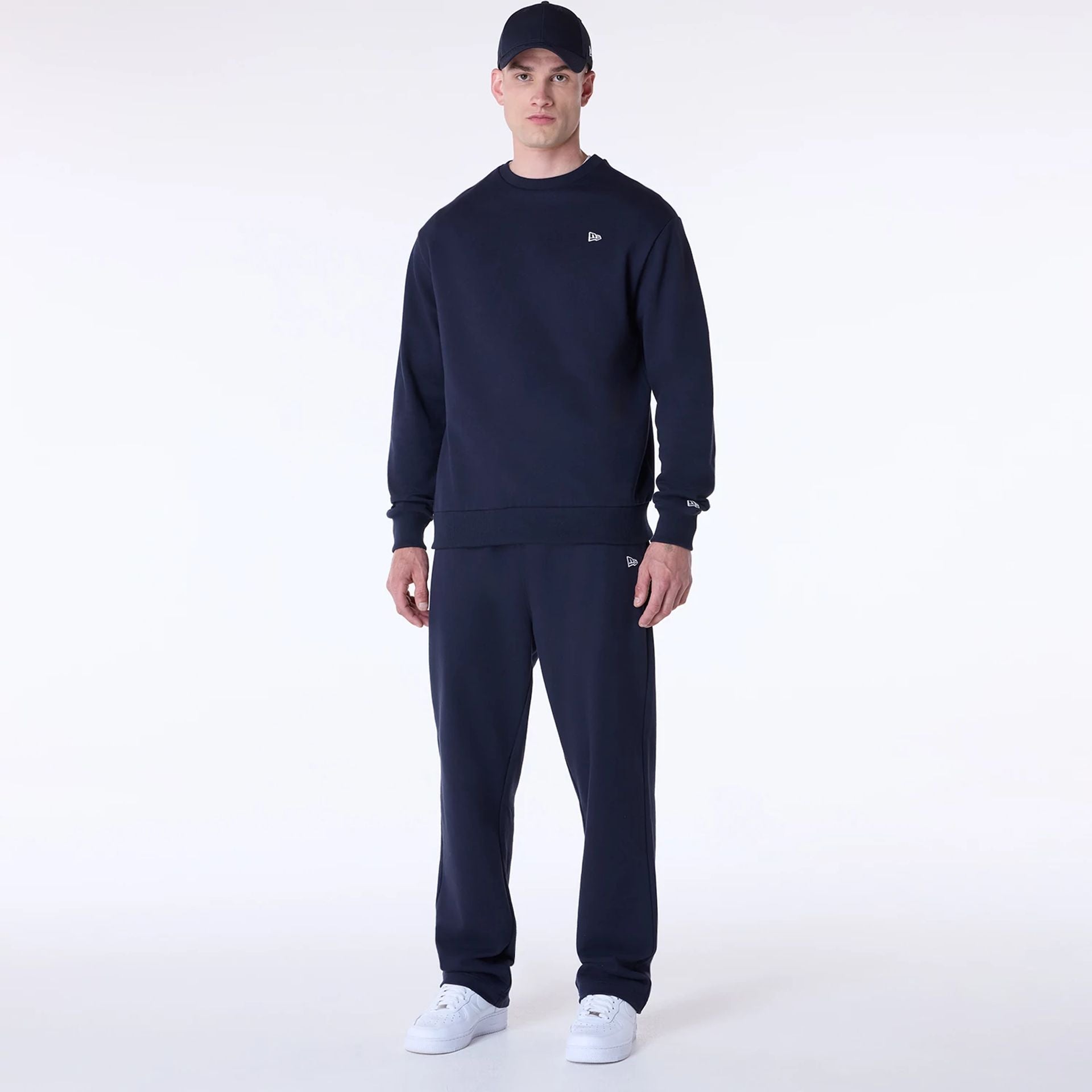 The Male model is wearing New Era Straight Navy Joggers 6