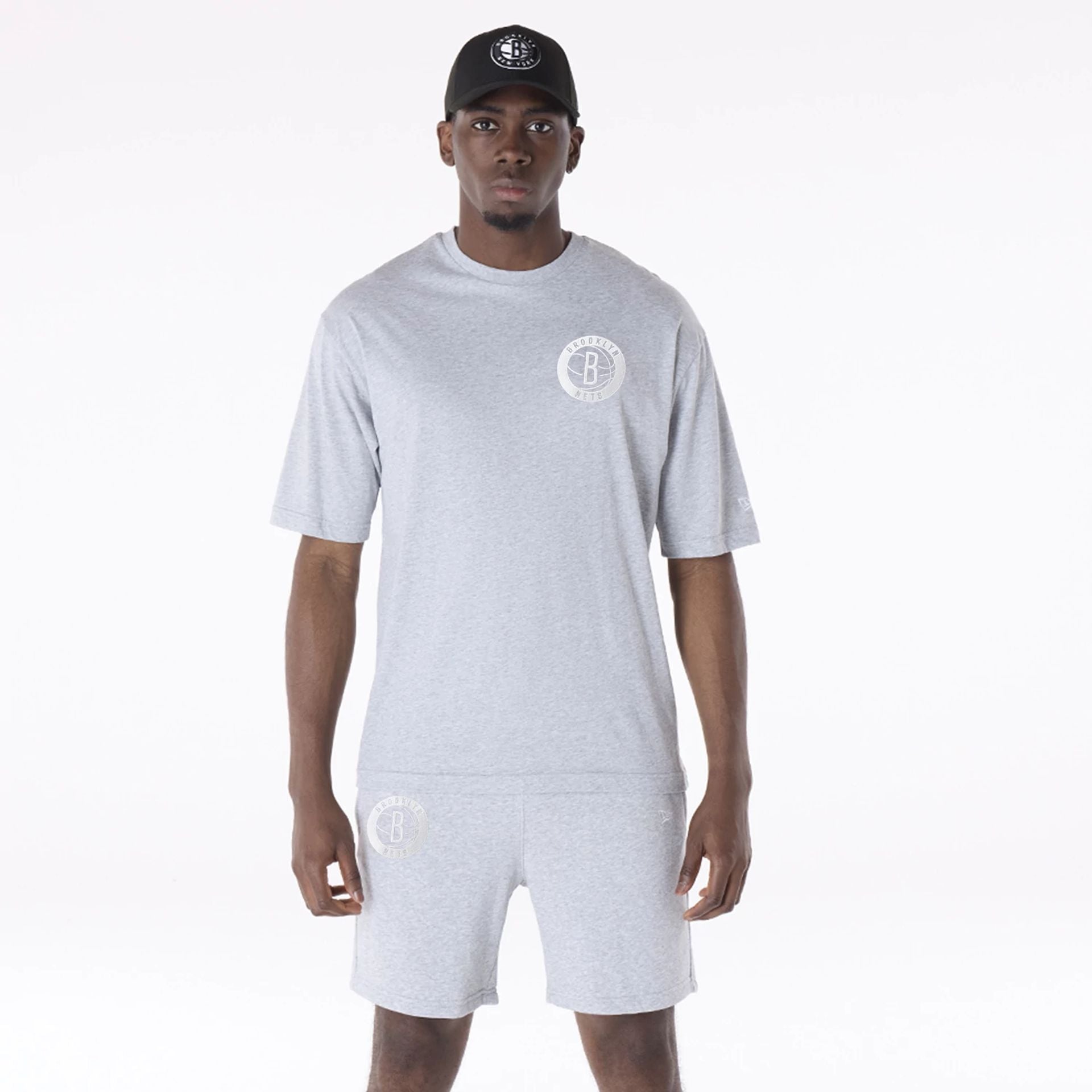 The Male model is wearing Brooklyn Nets NBA League Essential Grey Oversized T-Shirt 1