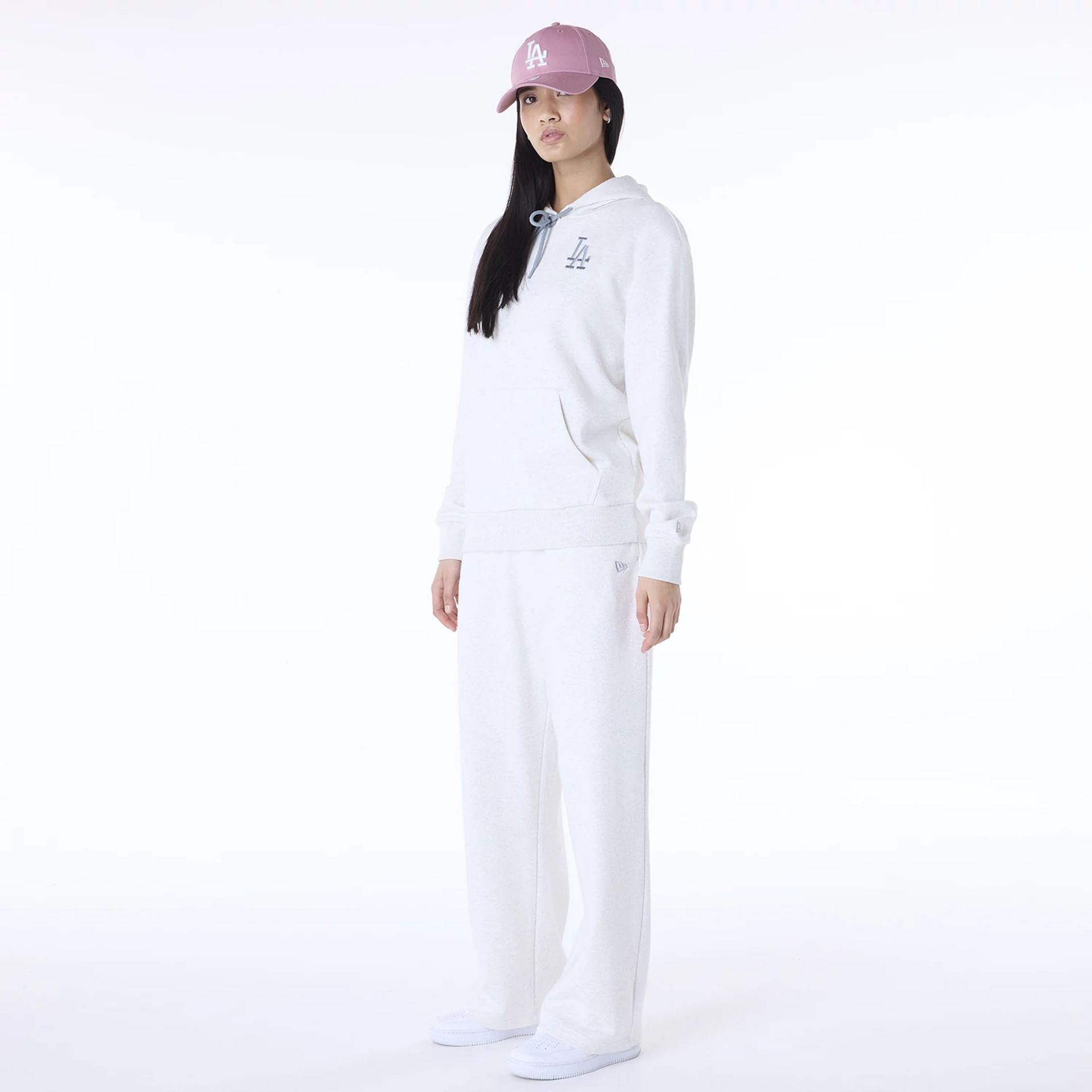 The Female model is wearing LA Dodgers MLB League Essential Pastel Grey Track Suit 6