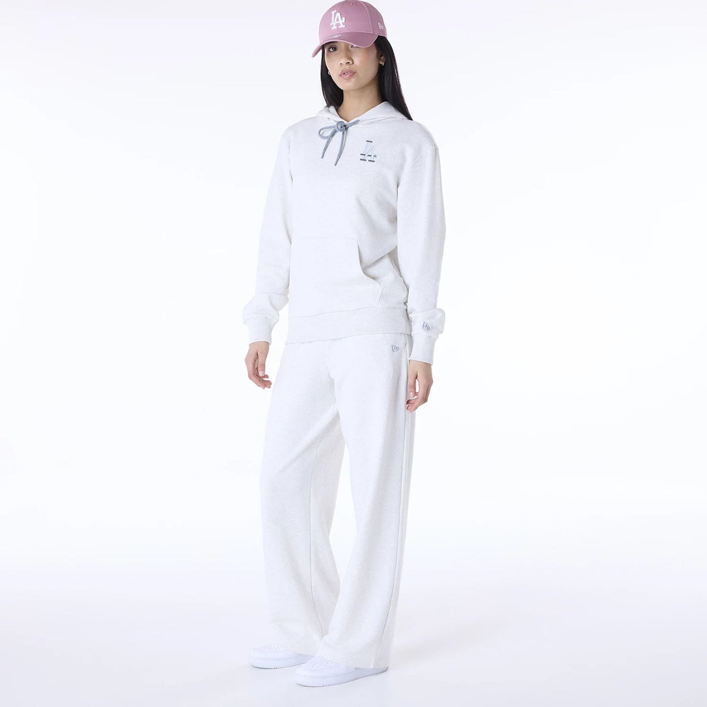 The Female model is wearing LA Dodgers MLB League Essential Pastel Grey Track Suit 7