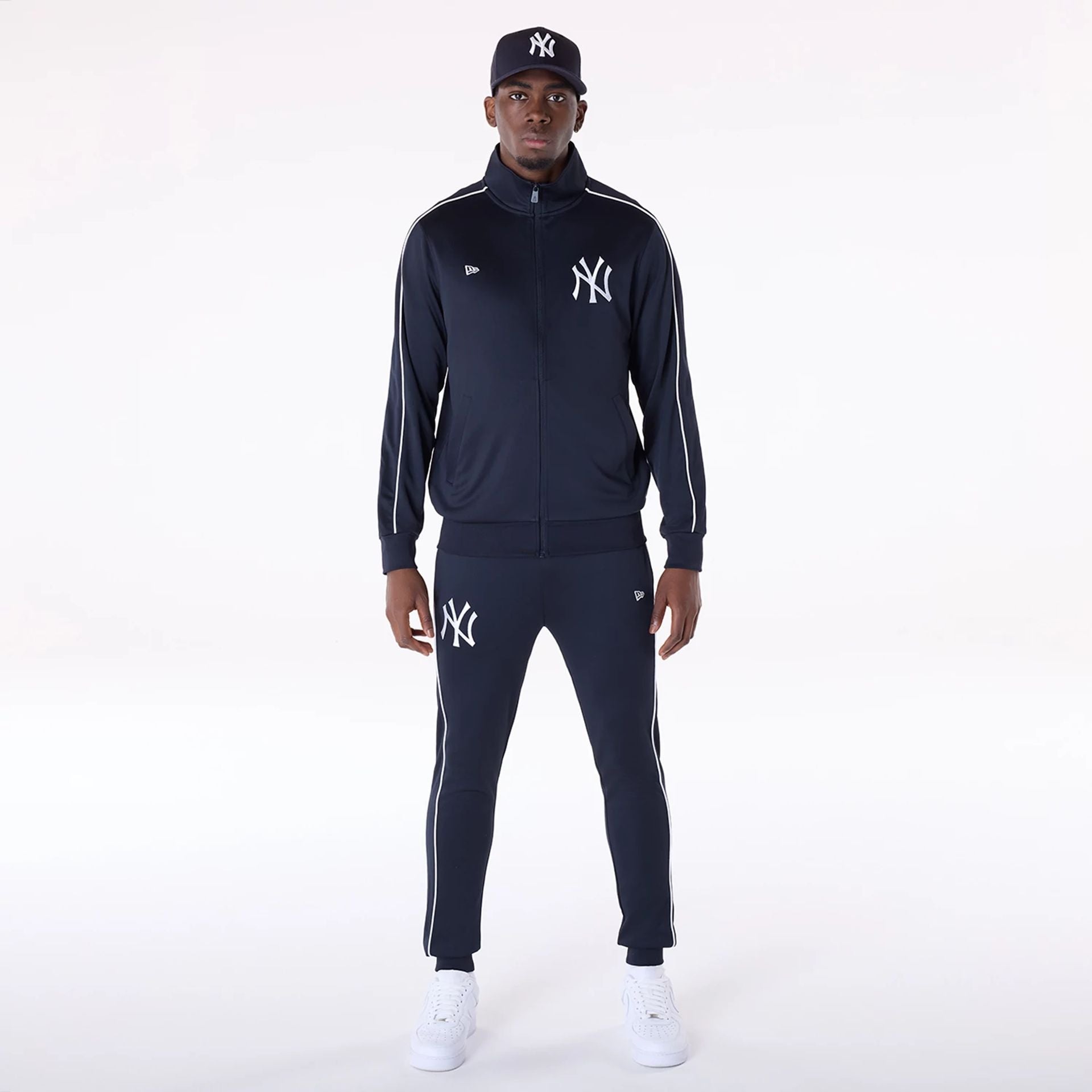 The Male model is wearing New York Yankees MLB Poly Track Set Navy Track Suit 1