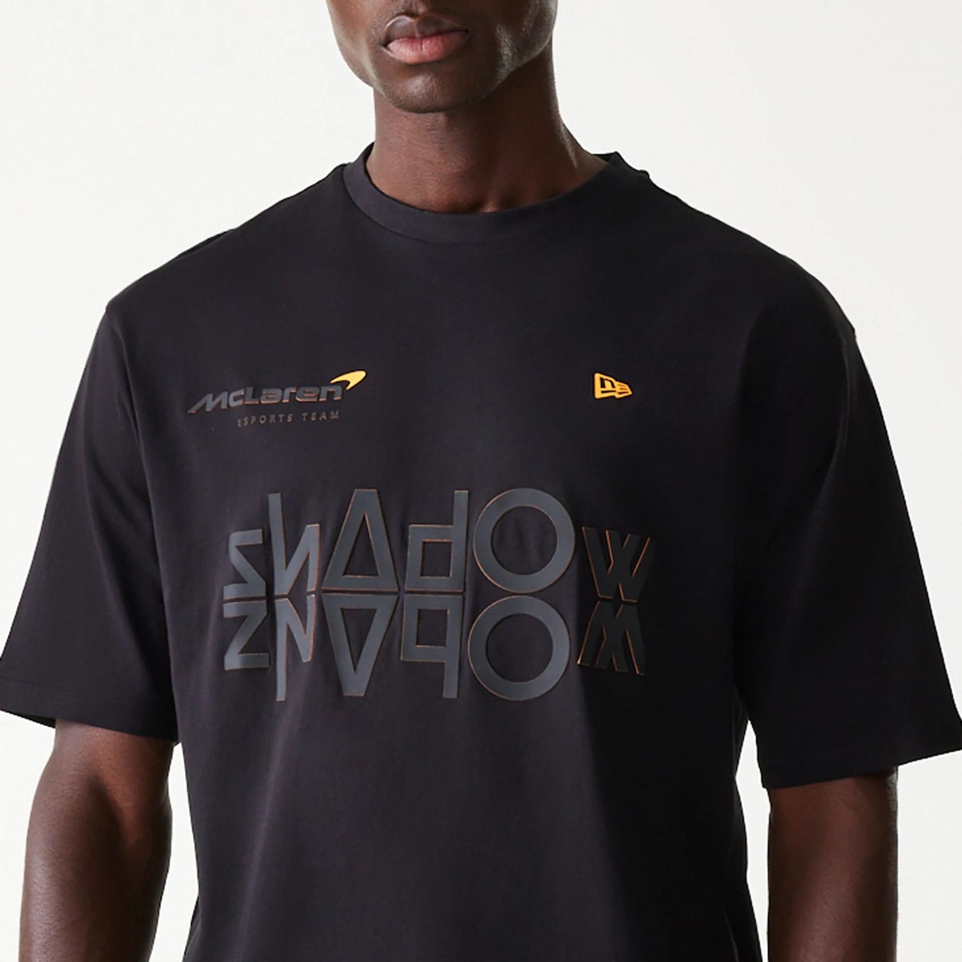 The Male model is wearing McLaren Racing Shadow Black Oversized T-Shirt 6