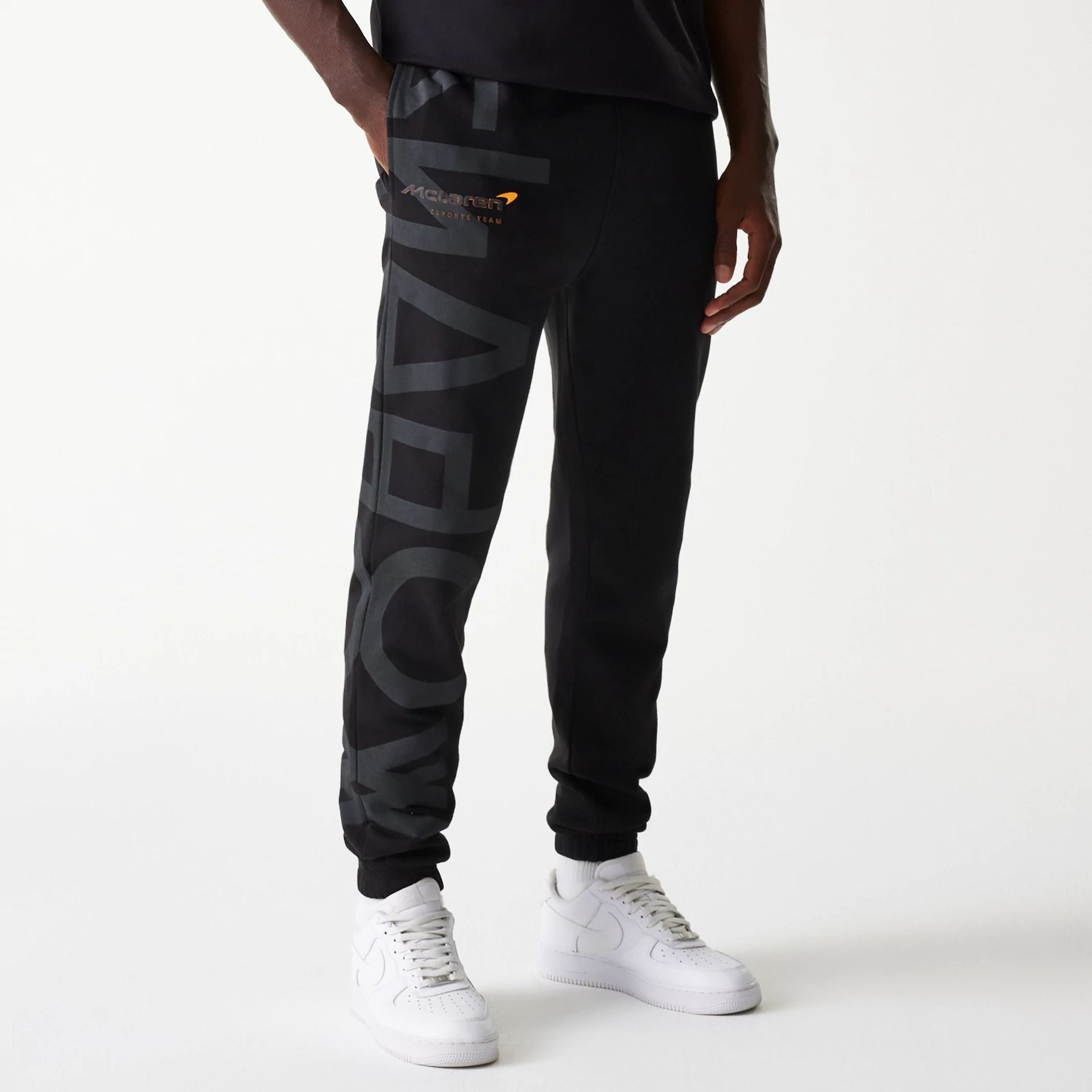 The Male model is wearing McLaren Racing Shadow Black Fleece Joggers 3