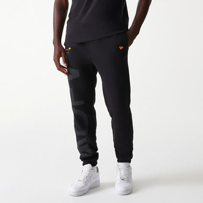 The Male model is wearing McLaren Racing Shadow Black Fleece Joggers 4