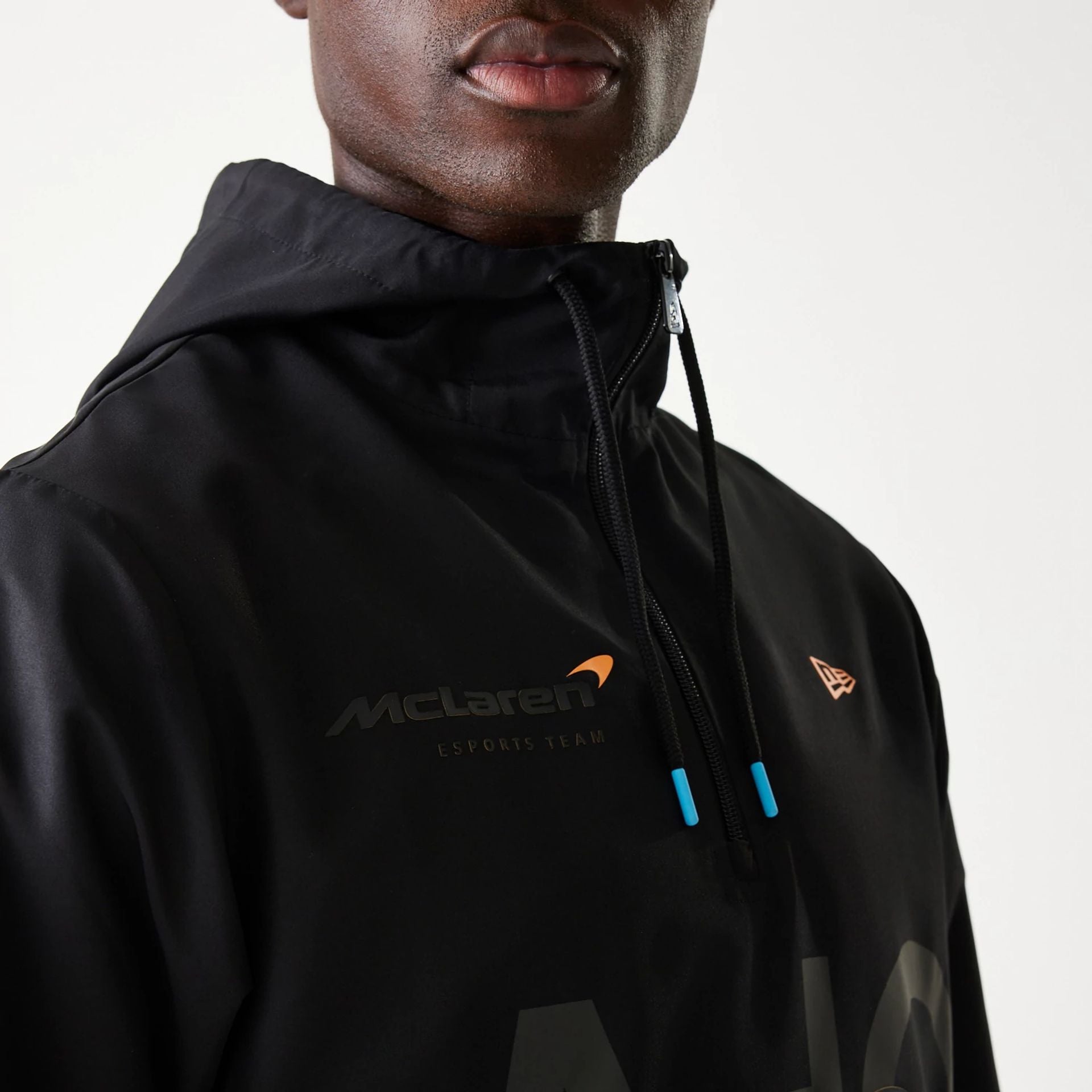 The Male model is wearing McLaren Racing Shadow Black Windbreaker Jacket 4