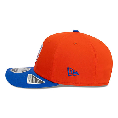 This is a Jijantes FC Kings League Draft Orange 9SEVENTY Stretch Snap Adjustable Cap 7