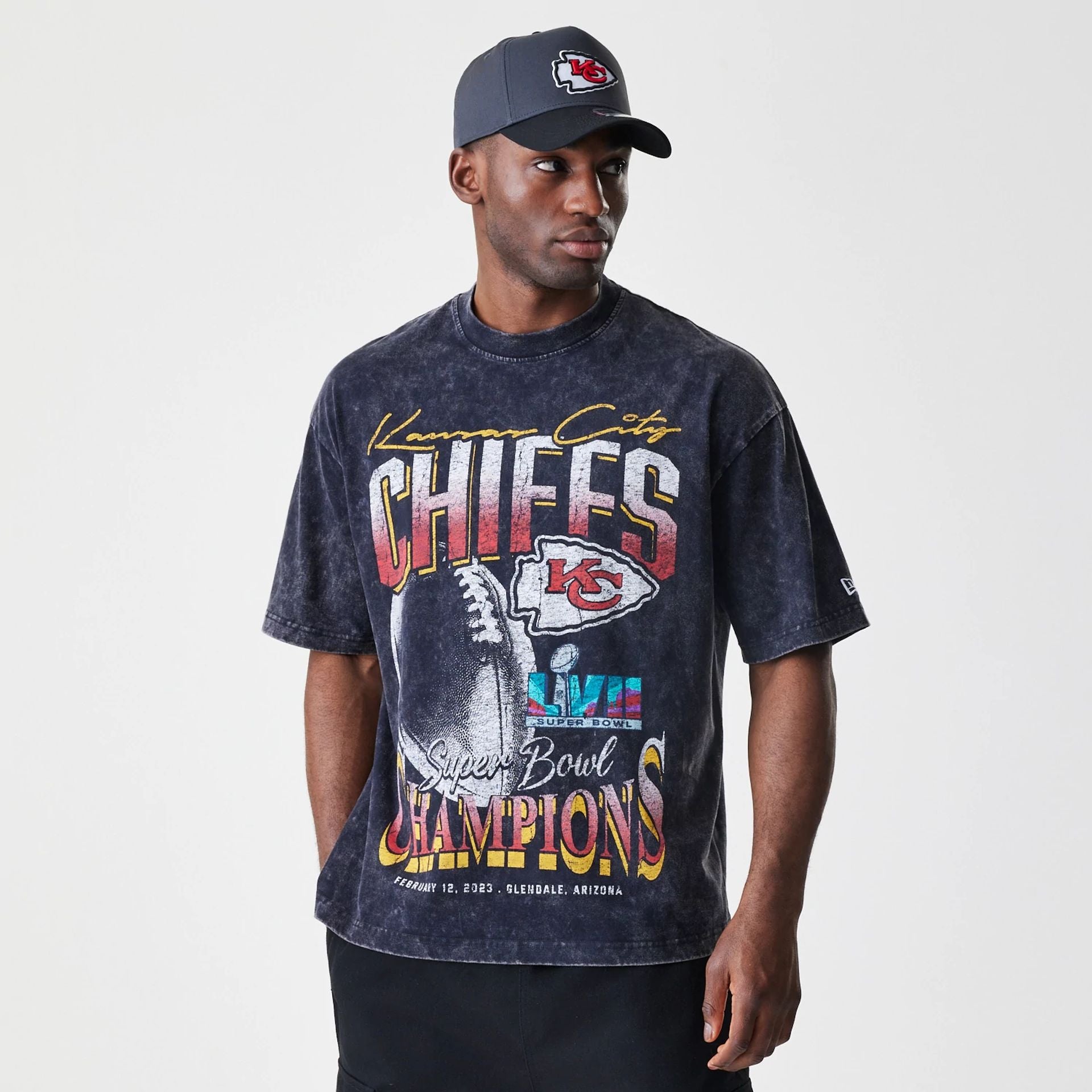 The Male model is wearing Kansas City Chiefs Sport Classic Black T-Shirt 1