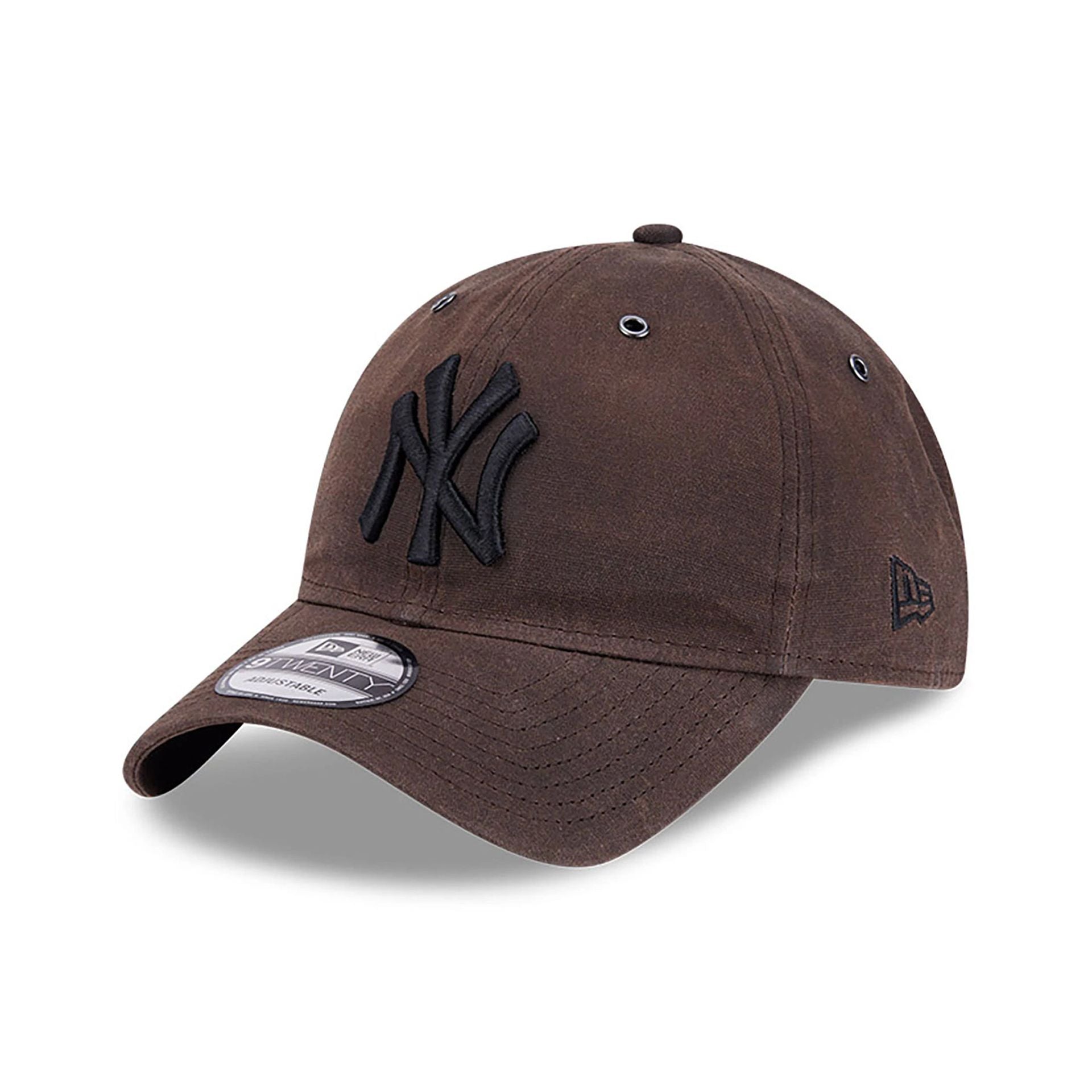 This is a New York Yankees Waxed Canvas Dark Brown 9TWENTY Adjustable Cap 1