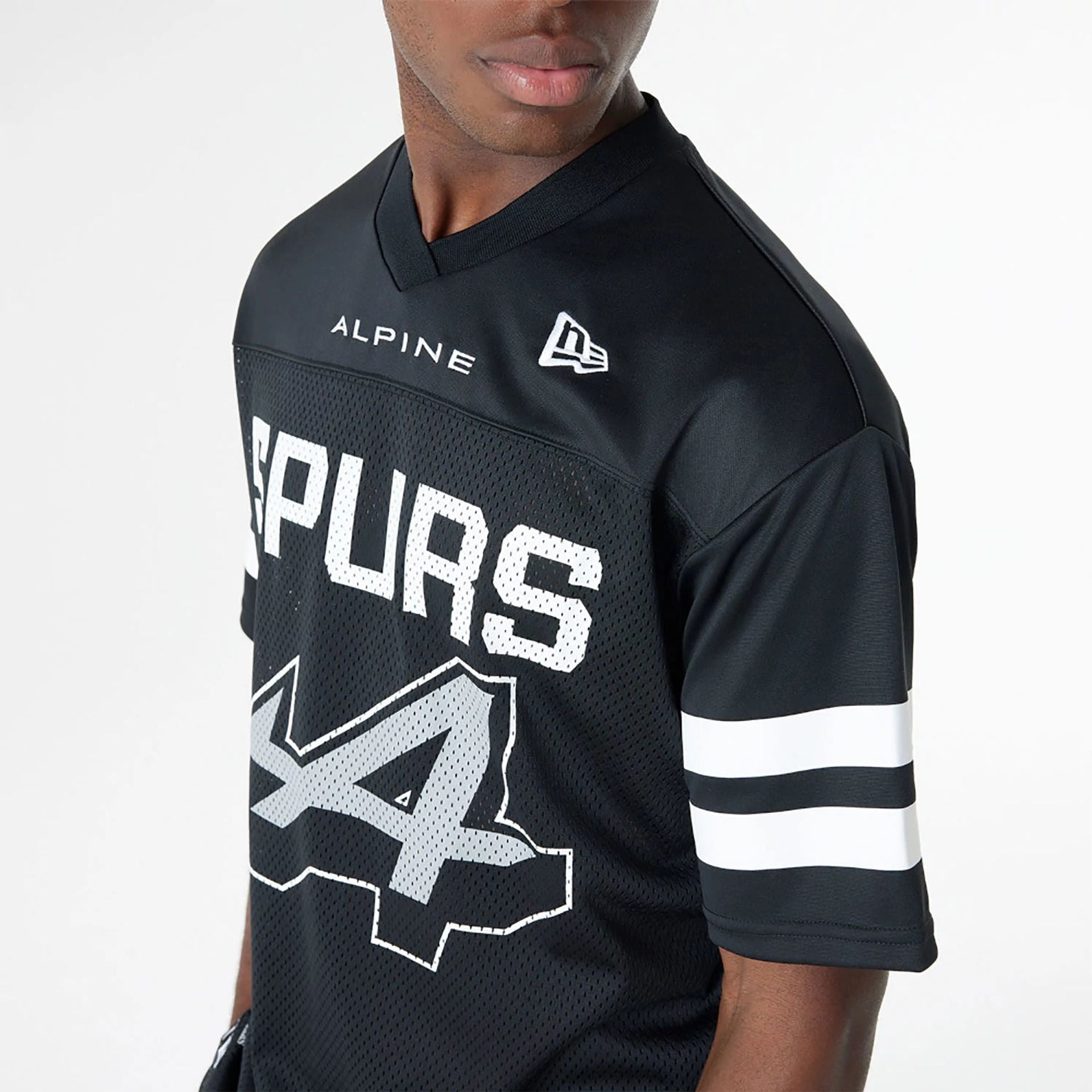 The Male model is wearing BTW Alpine F1 Racing x San Antonio Spurs Black Mesh T-Shirt 4