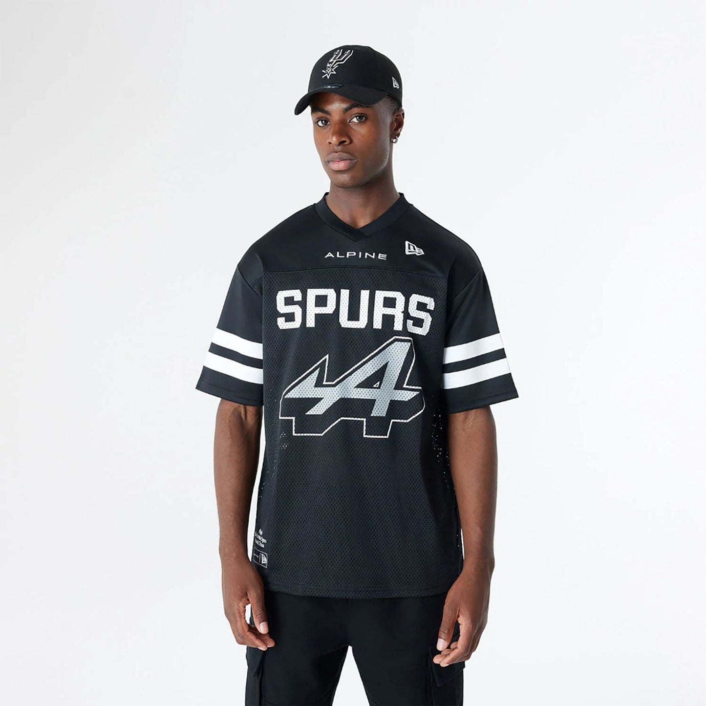 The Male model is wearing BTW Alpine F1 Racing x San Antonio Spurs Black Mesh T-Shirt 1