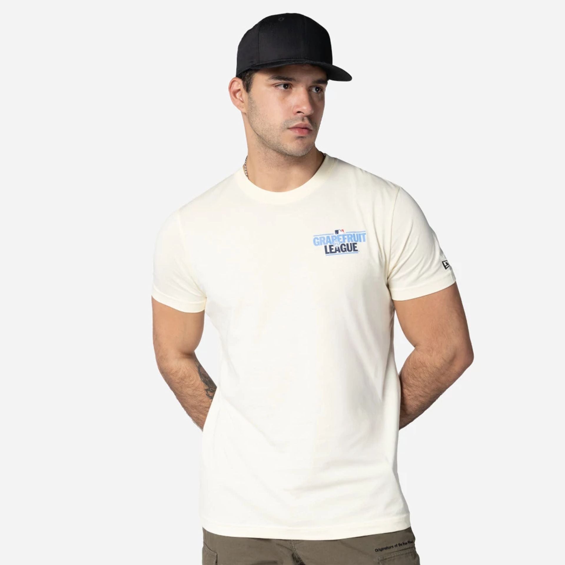 The Male model is wearing Grapefruit League Spring Training 2025 Cream T-Shirt 1