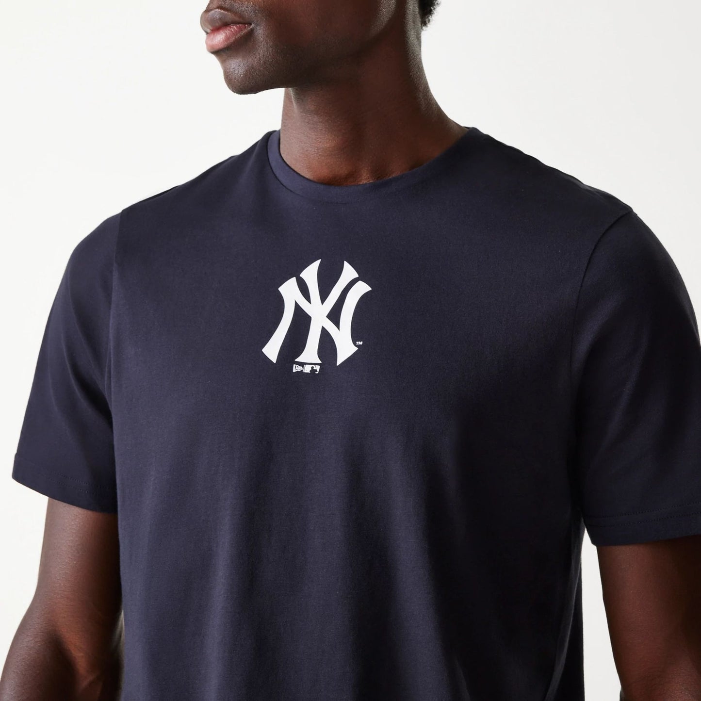 The Male model is wearing New York Yankees MLB Navy T-Shirt 3