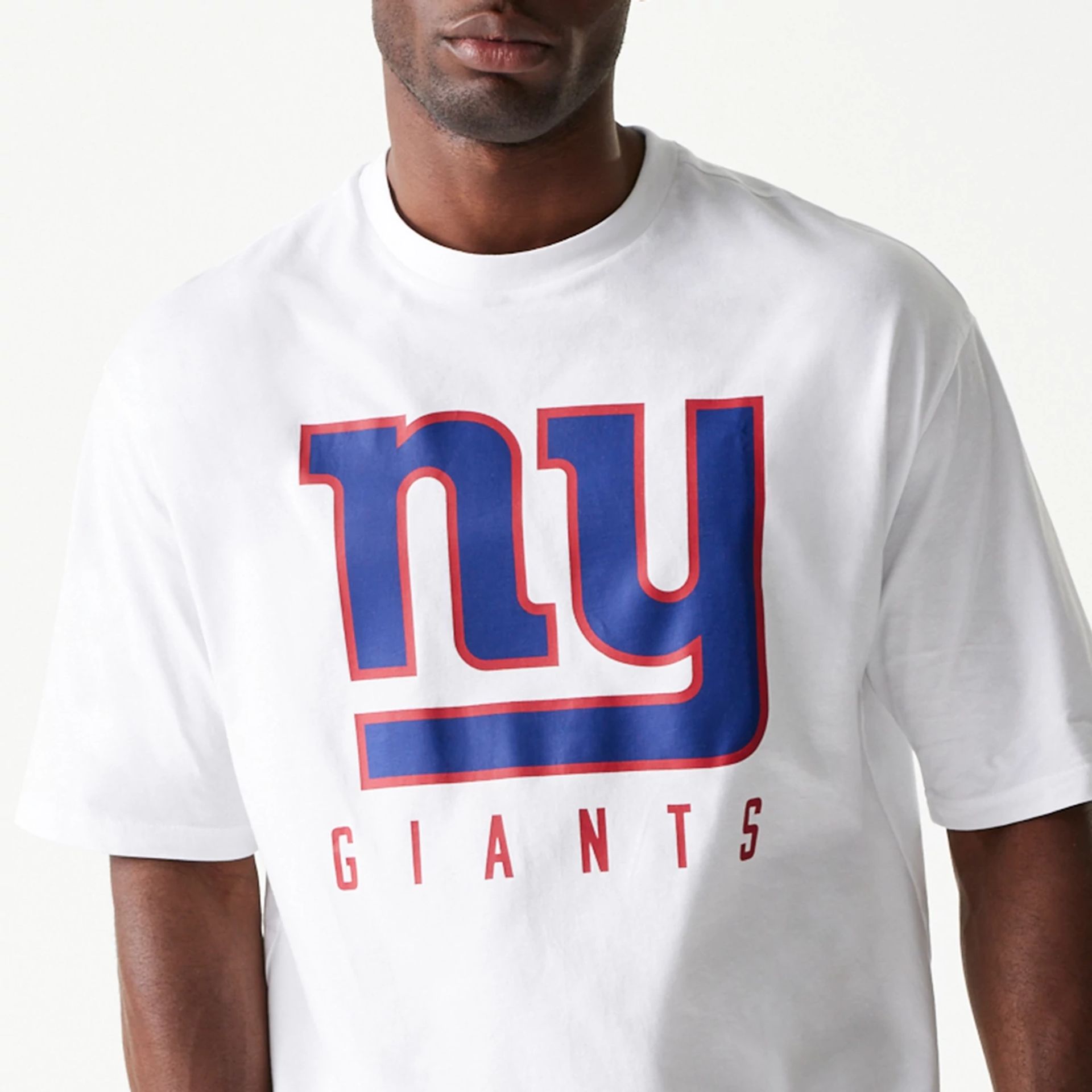 The Male model is wearing New York Giants NFL Games Slogan White Oversized T-Shirt 2