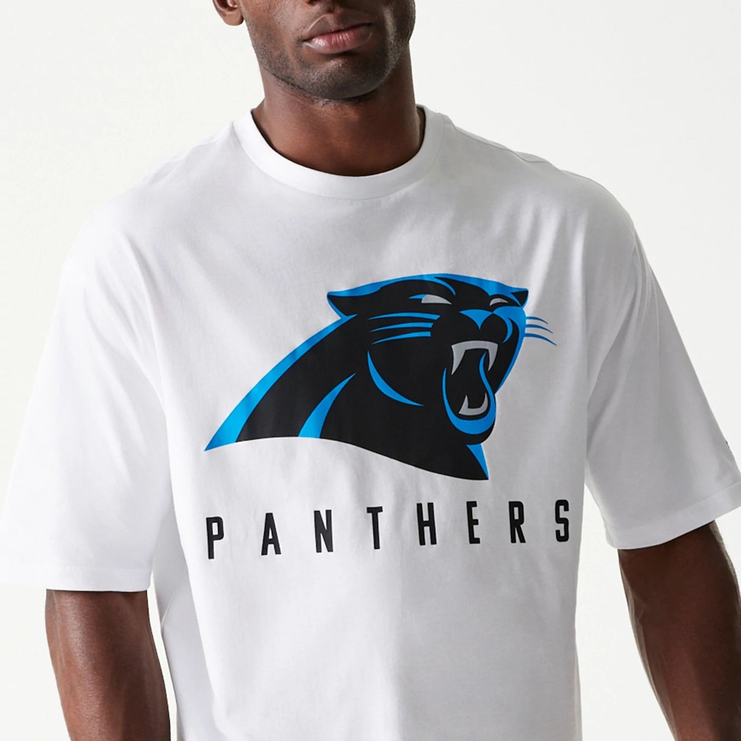 The Male model is wearing Carolina Panthers NFL Games Slogan White Oversized T-Shirt 2