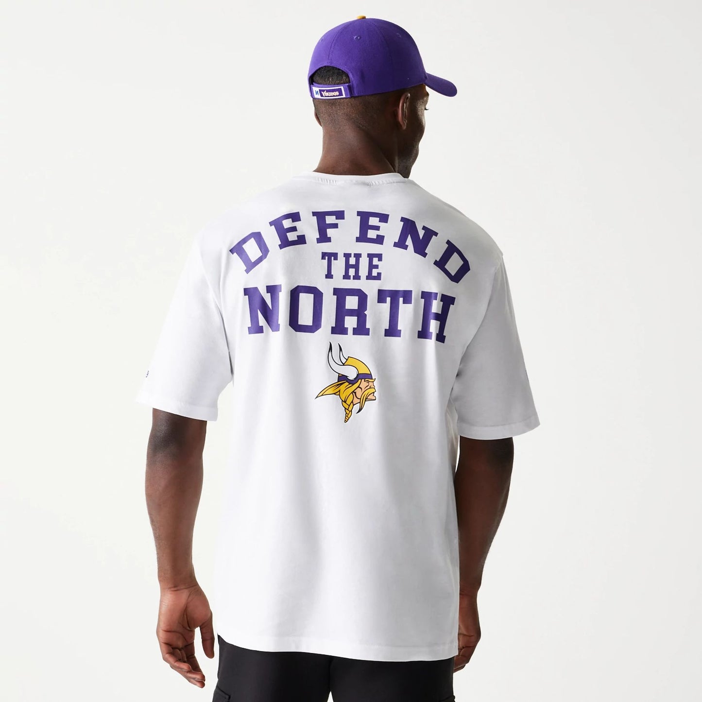 The Male model is wearing Minnesota Vikings NFL Games Square Arch White Oversized T-Shirt 7