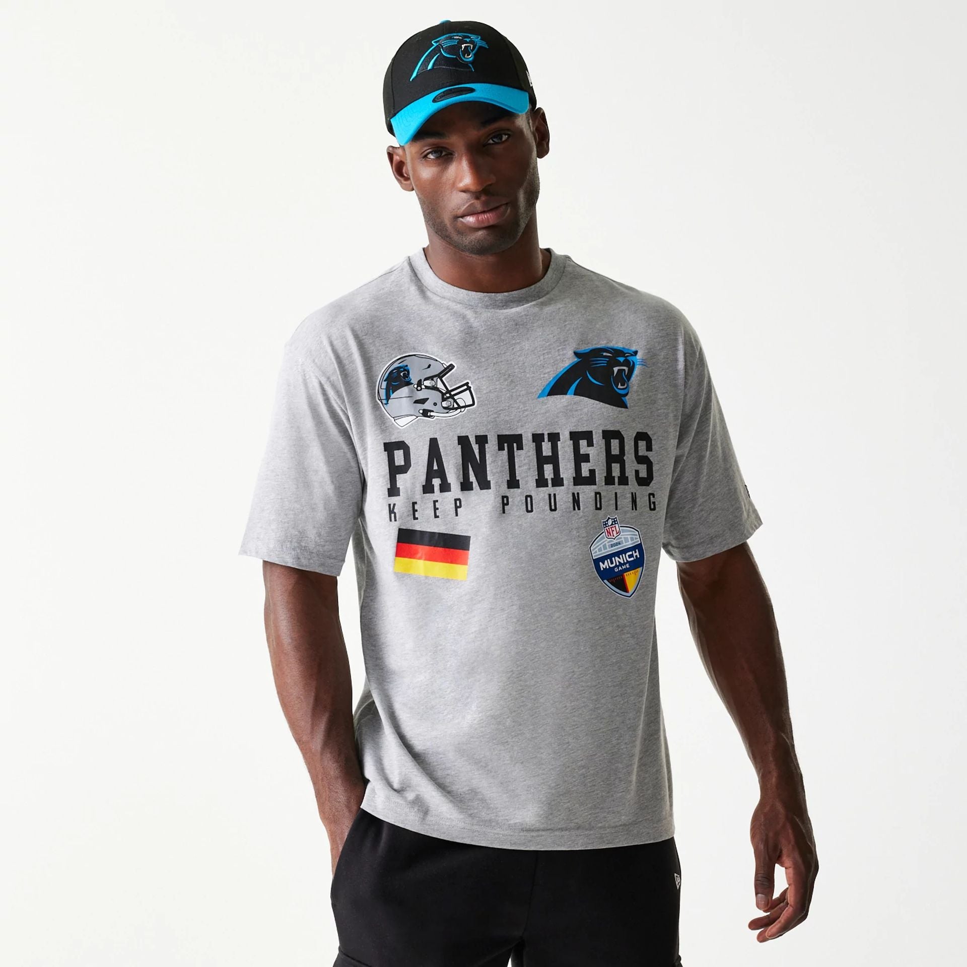 The Male model is wearing Carolina Panthers NFL Games Collegiate Grey Oversized T-Shirt 1