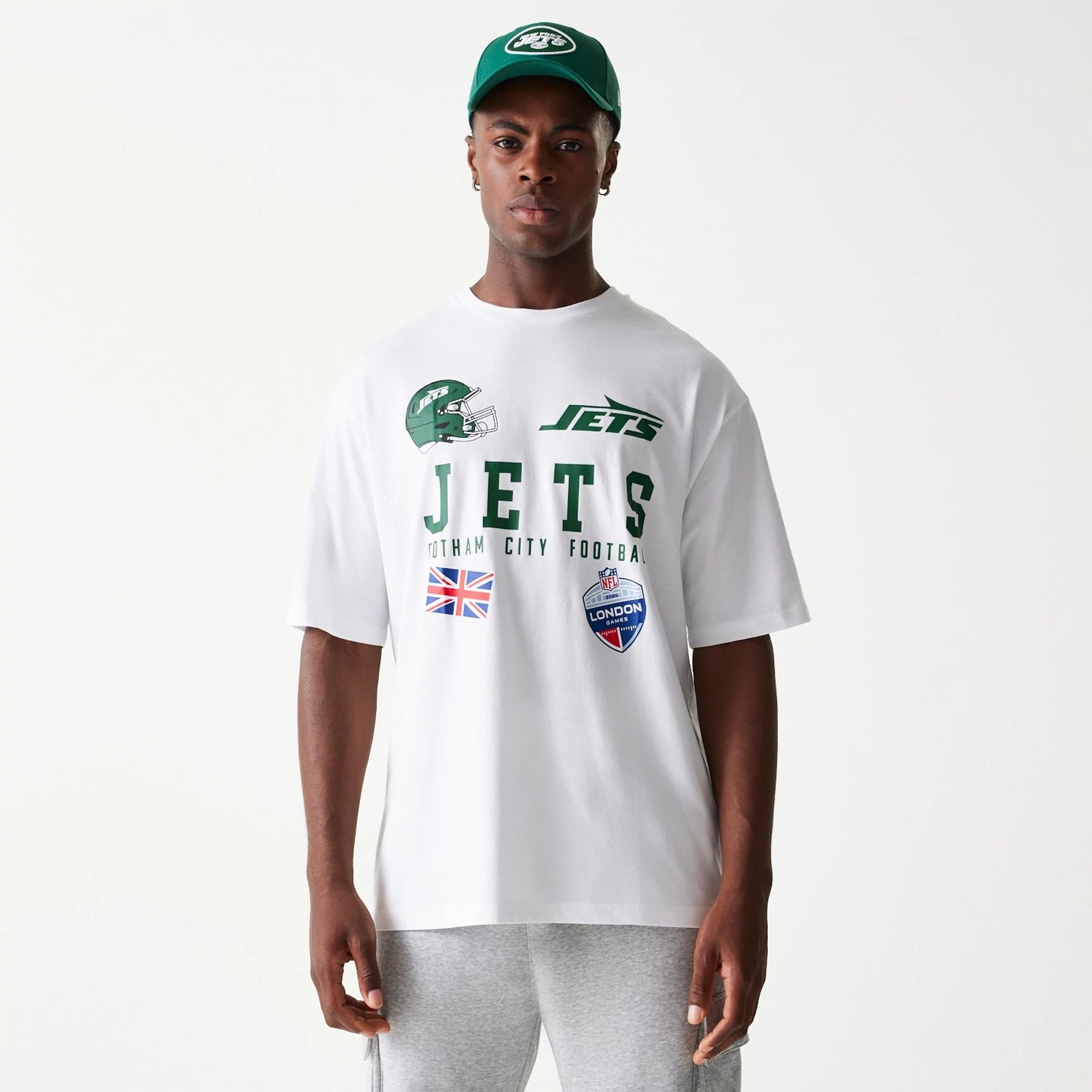 The Male model is wearing New York Jets NFL Games Collegiate White Oversized T-Shirt 1