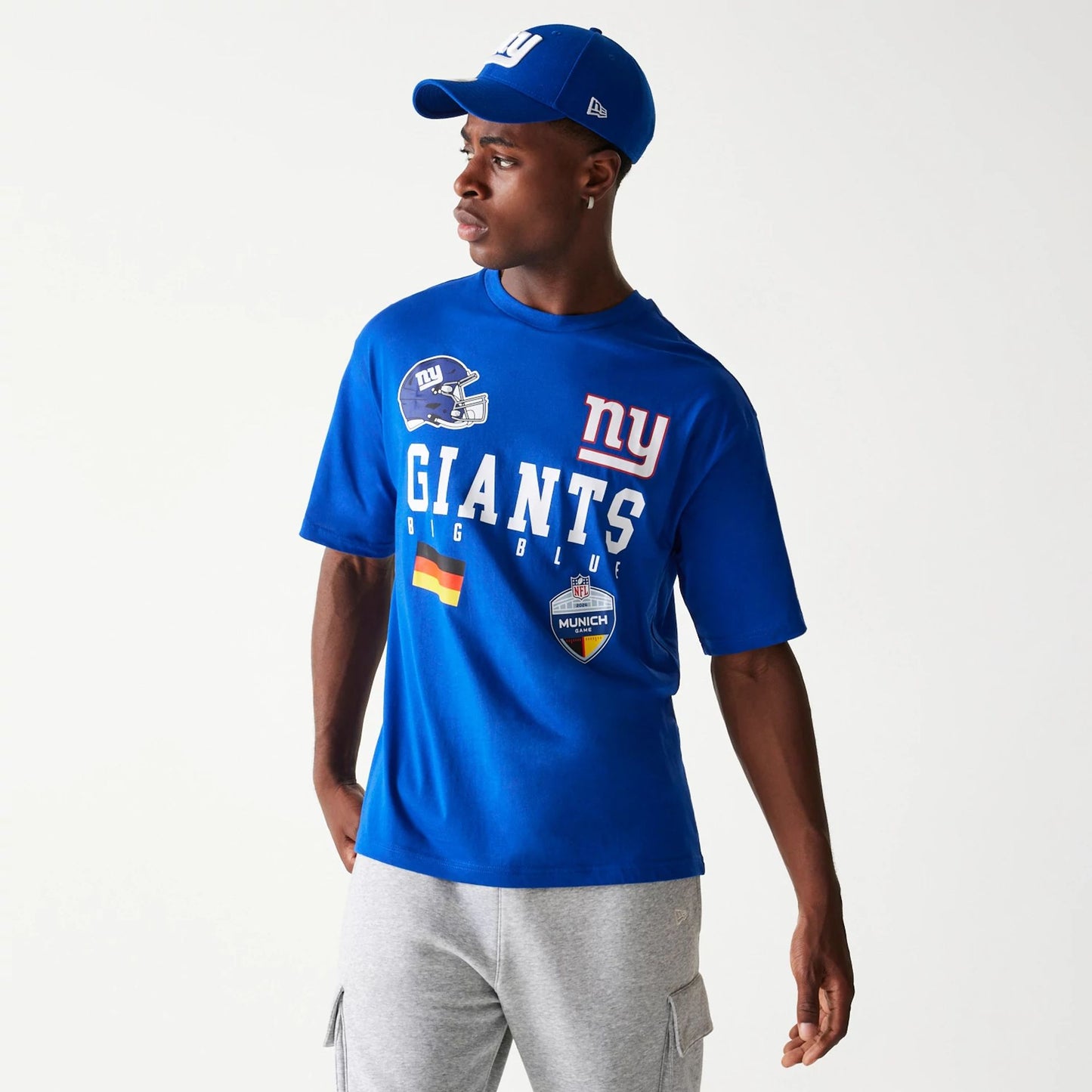 The Male model is wearing New York Giants NFL Games Collegiate Blue Oversized T-Shirt 1