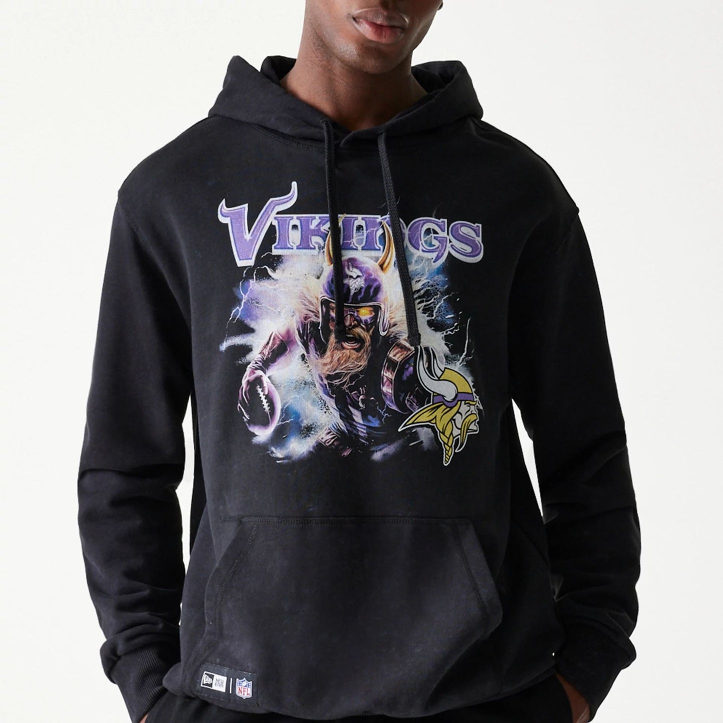 The Male model is wearing Minnesota Vikings NFL Games Premium Apparel Black Oversized Pullover Hoodie 2