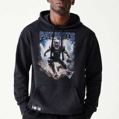 The Male model is wearing New England Patriots NFL Games Premium Apparel Black Oversized Pullover Hoodie 2