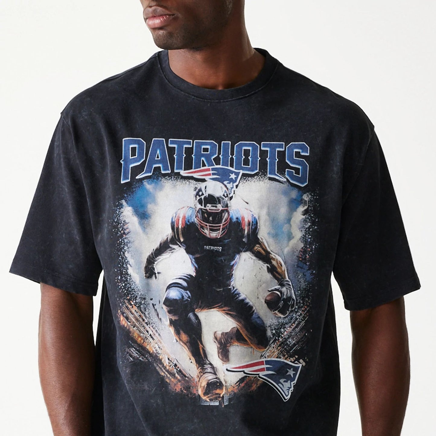 The Male model is wearing New England Patriots NFL Games Premium Apparel Black Oversized T-Shirt 2